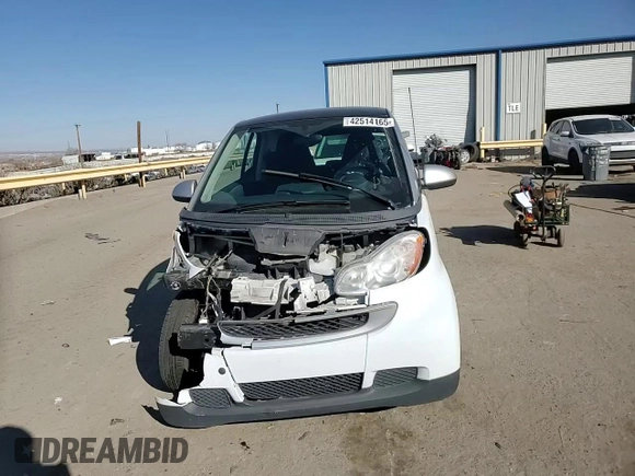 2010 Smart fortwo Pure with VIN WMEEJ3BA4AK341838, listed as a Copart auction lot 42514165 with 86,418 mi miles and Salvage title. Bid and sale history available at DreamBid. Image 11.
