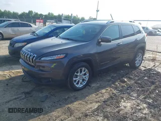 2014 Jeep Cherokee Latitude with VIN 1C4PJLCB6EW241897, listed as a IAAI auction lot 42128880 with 126,242 mi miles. Bid and sale history available at carsss.com. Image 19.