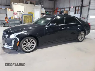 2014 Cadillac CTS Premium AWD with VIN 1G6AZ5S36E0184319, listed as a Copart auction lot 57847875 with 86,669 mi miles and Salvage title. Bid and sale history available at DreamBid. Image 1.