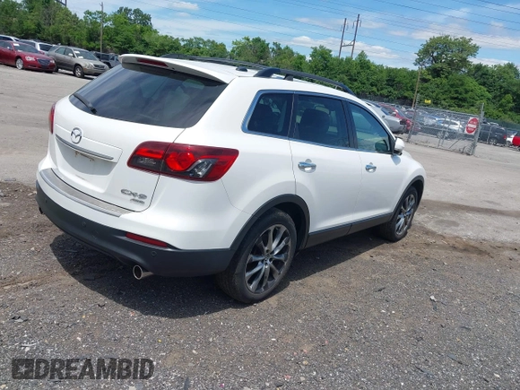 2014 Mazda CX-9 Grand Touring z VIN JM3TB3DV0E0436649, wystawiony jako IAAI lot #42319638 z przebiegiem 128 421 mil mil oraz . Historia ofert i sprzedaży dostępna na DreamBid. Obrazek 4.