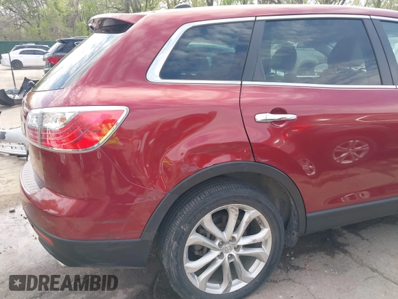 2011 Mazda CX-9 Grand Touring z VIN JM3TB2DA6B0310296, wystawiony jako IAAI lot #42022744 z przebiegiem 163 889 mil mil oraz . Historia ofert i sprzedaży dostępna na DreamBid. Obrazek 6.