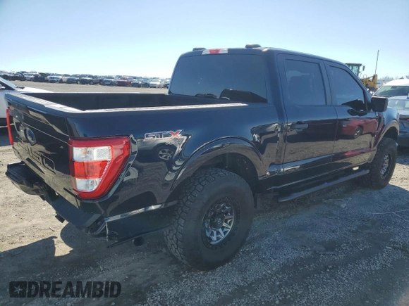 2023 Ford F-150 XL with VIN 1FTFW1E55PKD59670, listed as a Copart auction lot 48297005 with 20,668 mi miles and Salvage Title. Bid and sale history available at carsss.com. Image 3.