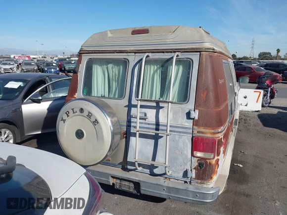 1989 GMC Vandura z VIN 1GDEG25K1K7521984, wystawiony jako IAAI lot #41371811 z przebiegiem 43 502 mil mil oraz . Historia ofert i sprzedaży dostępna na DreamBid. Obrazek 15.