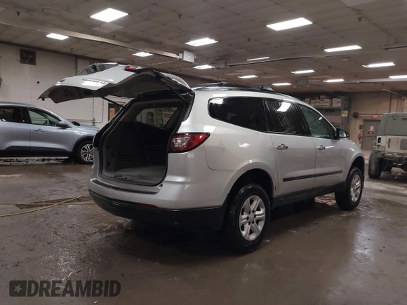 2013 Chevrolet Traverse LS with VIN 1GNKVFKD7DJ138235, listed as a IAAI auction lot 41666011 with 134,731 mi miles and . Bid and sale history available at DreamBid. Image 4.
