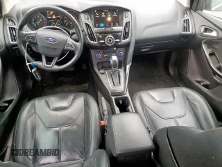 2018 Ford Focus Titanium z VIN 1FADP3N2XJL289659, wystawiony jako Copart lot #65594275 z przebiegiem 115 739 mil mil oraz Czysty tytuł • Clean title. Historia ofert i sprzedaży dostępna na DreamBid. Obrazek 8.