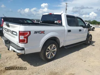 2018 Ford F-150 XL with VIN 1FTEW1CPXJKF27567, listed as a Copart auction lot 63034034 with 125,508 mi miles and Salvage title. Bid and sale history available at DreamBid. Image 3.
