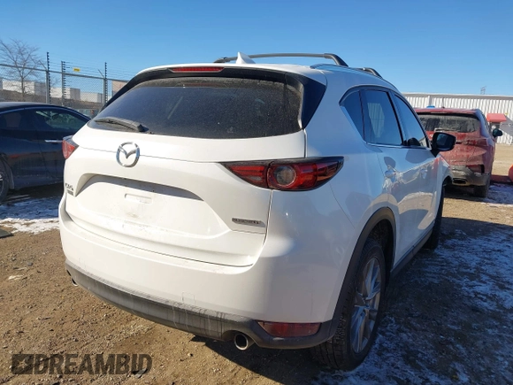 2020 Mazda CX-5 Grand Touring with VIN JM3KFADM5L1815374, listed as a IAAI auction lot 41416077 with 44,190 mi miles. Bid and sale history available at carsss.com. Image 4.