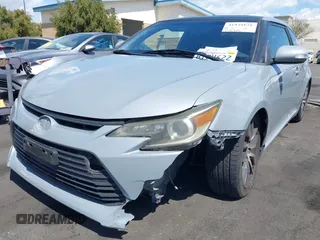2014 Scion tC with VIN JTKJF5C71E3077886, listed as a IAAI auction lot 41939128 with 138,845 mi miles. Bid and sale history available at carsss.com. Image 6.
