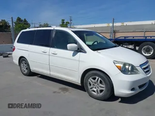 2005 Honda Odyssey EX-L with VIN 5FNRL38605B045246, listed as a IAAI auction lot 42183883 with 164,072 mi miles and . Bid and sale history available at carsss.com. Image 1.