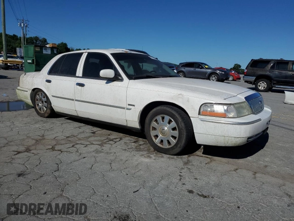 2005 Mercury Grand Marquis LS Premium z VIN 2MEFM75W95X618252, wystawiony jako Copart lot #57810045 z przebiegiem Nie podano mil oraz Czysty tytuł • Clean title. Historia ofert i sprzedaży dostępna na DreamBid. Obrazek 4.
