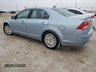 2010 Mercury Milan Hybrid with VIN 3MEDM0L31AR652976, listed as a Copart auction lot 82427944 with 115,014 mi miles and Salvage Title. Bid and sale history available at carsss.com. Image 2.