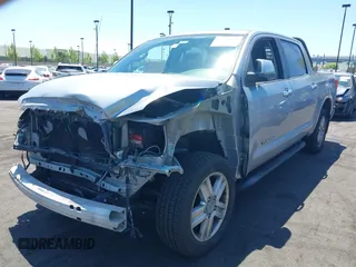 2013 Toyota Tundra Limited with VIN 5TFFY5F16DX135805, listed as a IAAI auction lot 42218616 with 151,310 mi miles and . Bid and sale history available at DreamBid. Image 2.