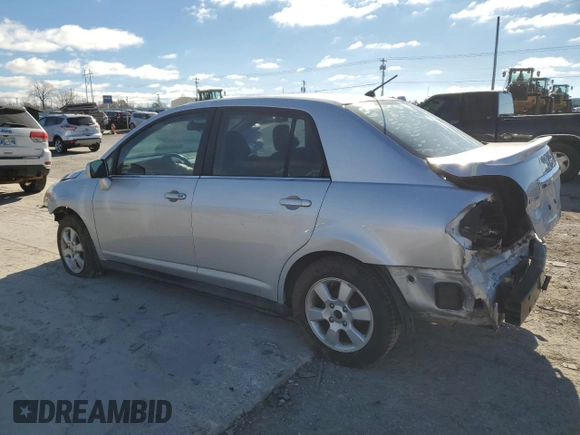 2009 Nissan Versa 1.8 S with VIN 3N1BC11E29L372166, listed as a Copart auction lot 86772944 with 0 mi miles and Salvage Title. Bid and sale history available at carsss.com. Image 2.