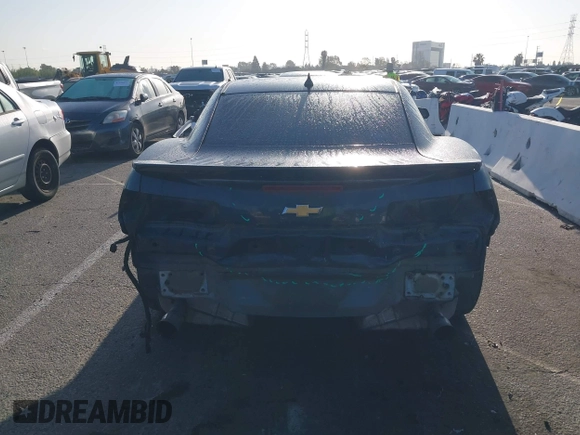 2014 Chevrolet Camaro LT z VIN 2G1FB1E35E9126793, wystawiony jako IAAI lot #41959896 z przebiegiem Nie podano mil oraz . Historia ofert i sprzedaży dostępna na DreamBid. Obrazek 17.