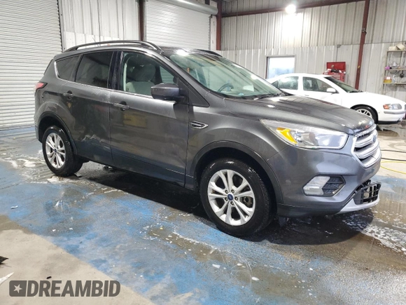 2018 Ford Escape SE with VIN 1FMCU9G90JUB48553, listed as a Copart auction lot 51171255 with 134,423 mi miles and Salvage Title. Bid and sale history available at carsss.com. Image 4.