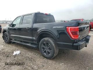 2023 Ford F-150 XL with VIN 1FTEW1C59PFC27499, listed as a Copart auction lot 54453255 with 58,554 mi miles and Salvage title. Bid and sale history available at DreamBid. Image 2.