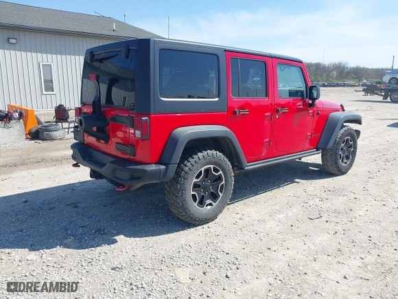 2015 Jeep Wrangler Unlimited Rubicon Hard Rock with VIN 1C4HJWFG9FL525556, listed as a IAAI auction lot 41973576 with 246,949 mi miles. Bid and sale history available at carsss.com. Image 4.