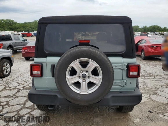 2023 Jeep Wrangler Sport with VIN 1C4HJXAG0PW595881, listed as a Copart auction lot 65590025 with 19,597 mi miles and Salvage title. Bid and sale history available at DreamBid. Image 6.