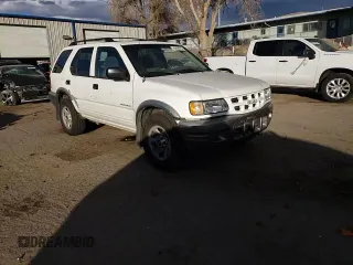2002 Isuzu Rodeo S with VIN 4S2CK58W324314240, listed as a Copart auction lot 43694015 with 132,212 mi miles and Salvage title. Bid and sale history available at DreamBid. Image 11.