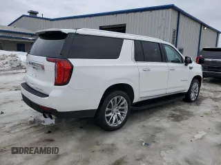 2022 GMC Yukon XL Denali with VIN 1GKS2JKL8NR208795, listed as a Copart auction lot 48006895 with 58,706 mi miles and Salvage Title. Bid and sale history available at carsss.com. Image 3.