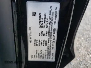2023 Tesla Model 3 with VIN 5YJ3E1EA6PF454254, listed as a Copart auction lot 56881355 with 30,327 mi miles and Salvage title. Bid and sale history available at DreamBid. Image 12.
