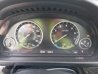 2014 BMW 5 Series 528i xDrive with VIN WBA5A7C52ED616976, listed as a IAAI auction lot 42067334 with 98,286 mi miles and . Bid and sale history available at DreamBid. Image 7.