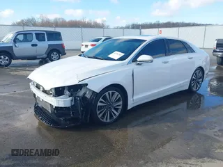 2017 Lincoln MKZ Reserve z VIN 3LN6L5FCXHR611273, wystawiony jako IAAI lot #41794752 z przebiegiem 74 652 mil mil oraz . Historia ofert i sprzedaży dostępna na DreamBid. Obrazek 2.