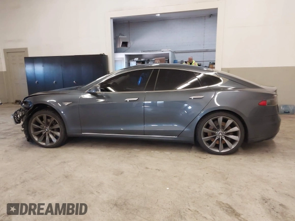 2014 Tesla Model S 60 with VIN 5YJSA1H13EFP49912, listed as a IAAI auction lot 41716661 with 129,776 mi miles and . Bid and sale history available at DreamBid. Image 15.