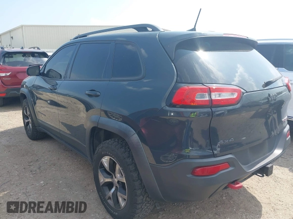 2016 Jeep Cherokee Trailhawk z VIN 1C4PJMBS0GW300131, wystawiony jako IAAI lot #42439009 z przebiegiem 173 571 mil mil oraz . Historia ofert i sprzedaży dostępna na DreamBid. Obrazek 3.