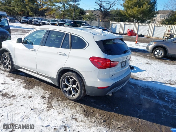 2018 BMW X1 xDrive28i with VIN WBXHT3C36J5L30217, listed as a IAAI auction lot 41237775 with 60,071 mi miles. Bid and sale history available at carsss.com. Image 3.