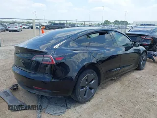 2023 Tesla Model 3 with VIN 5YJ3E1EA8PF454210, listed as a IAAI auction lot 42326822 with 43,200 mi miles and . Bid and sale history available at DreamBid. Image 4.
