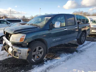 2005 Nissan Titan LE with VIN 1N6AA07B75N525086, listed as a Copart auction lot 44036025 with 169,175 mi miles and Salvage Title. Bid and sale history available at carsss.com. Image 1.
