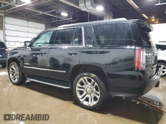 2016 GMC Yukon SLT with VIN 1GKS2BKC1GR440857, listed as a Copart auction lot 52683875 with 171,111 mi miles and Salvage Title. Bid and sale history available at carsss.com. Image 2.