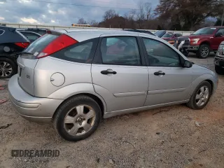 2004 Ford Focus with VIN 3FAFP37Z94R105076, listed as a Copart auction lot 82924224 with 218,253 mi miles and Clean title. Bid and sale history available at DreamBid. Image 3.