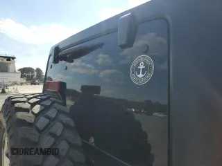 2014 Jeep Wrangler Sport with VIN 1C4AJWAG4EL233014, listed as a Copart auction lot 49868955 with 190,623 mi miles and Salvage Title. Bid and sale history available at carsss.com. Image 10.