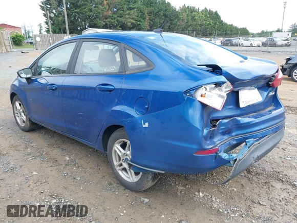 2018 Ford Fiesta SE z VIN 3FADP4BJXJM126168, wystawiony jako IAAI lot #42255261 z przebiegiem 121 248 mil mil oraz . Historia ofert i sprzedaży dostępna na DreamBid. Obrazek 3.
