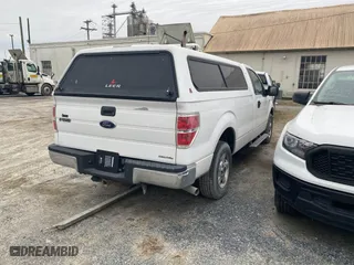 2014 Ford F-150 XL with VIN 1FTNF1CF5EKD79597, listed as a IAAI auction lot 41511800 with 100,758 mi miles. Bid and sale history available at carsss.com. Image 4.