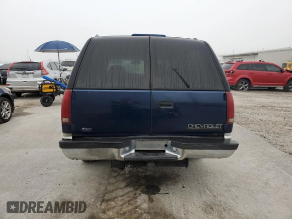 1996 Chevrolet Suburban with VIN 1GNEC16R8TJ359059, listed as a Copart auction lot 86344584 with 390,115 mi miles and Salvage Title. Bid and sale history available at carsss.com. Image 6.