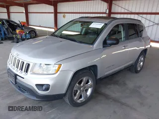 2011 Jeep Compass Limited with VIN 1J4NF5FB1BD169573, listed as a IAAI auction lot 42142681 with 236,590 mi miles. Bid and sale history available at carsss.com. Image 2.