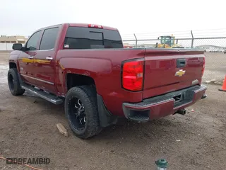 2014 Chevrolet Silverado 1500 High Country with VIN 3GCUKTEC7EG412306, listed as a IAAI auction lot 41721027 with 256,888 mi miles. Bid and sale history available at carsss.com. Image 3.