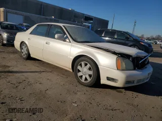 2003 Cadillac DeVille DTS z VIN 1G6KF57963U257494, wystawiony jako Copart lot #84532944 z przebiegiem 104 766 mil mil oraz Szkoda całkowita • Salvage title. Historia ofert i sprzedaży dostępna na DreamBid. Obrazek 4.