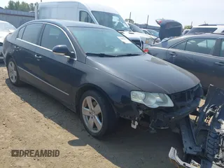 2009 Volkswagen Passat Komfort z VIN WVWJK73C99P023231, wystawiony jako IAAI lot #37562355 z przebiegiem 115 376 mil mil oraz . Historia ofert i sprzedaży dostępna na DreamBid. Obrazek 1.