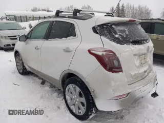2019 Buick Encore Essence with VIN KL4CJGSM5KB738932, listed as a Copart auction lot 83087444 with 59,162 mi miles and Salvage Title. Bid and sale history available at DreamBid. Image 2.