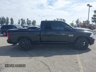 2016 Ram 1500 Express z VIN 1C6RR6FG5GS333031, wystawiony jako IAAI lot #42195110 z przebiegiem 144 921 mil mil oraz . Historia ofert i sprzedaży dostępna na DreamBid. Obrazek 13.