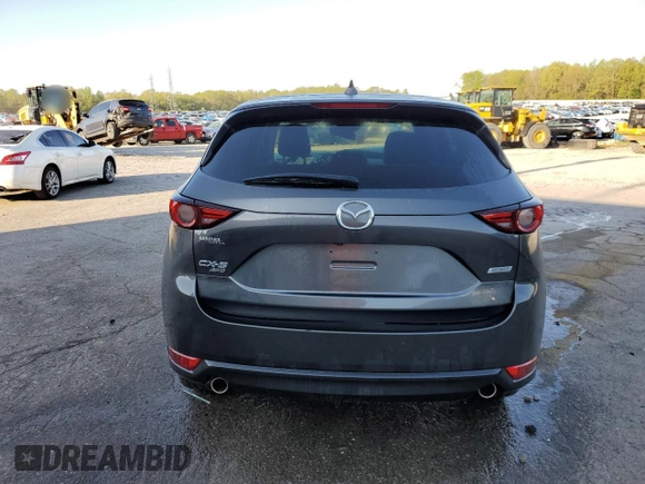 2019 Mazda CX-5 Grand Touring with VIN JM3KFBDM9K0676795, listed as a Copart auction lot 52129885 with 71,869 mi miles and Salvage Title. Bid and sale history available at carsss.com. Image 6.