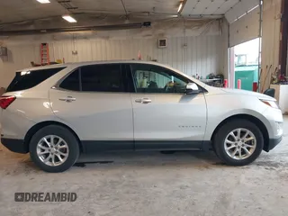 2019 Chevrolet Equinox LT z VIN 3GNAXJEV9KS633657, wystawiony jako IAAI lot #42379968 z przebiegiem 75 398 mil mil oraz . Historia ofert i sprzedaży dostępna na DreamBid. Obrazek 13.