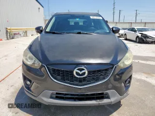 2014 Mazda CX-5 Touring with VIN JM3KE2CY5E0316077, listed as a Copart auction lot 58218735 with 190,789 mi miles and Salvage title. Bid and sale history available at DreamBid. Image 5.