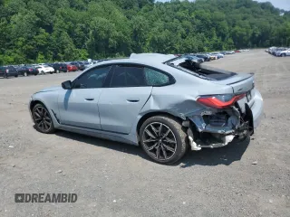 2023 BMW 4 Series 430i xDrive with VIN WBA73AV06PFP29080, listed as a Copart auction lot 60283705 with 47,104 mi miles and Salvage title. Bid and sale history available at DreamBid. Image 2.