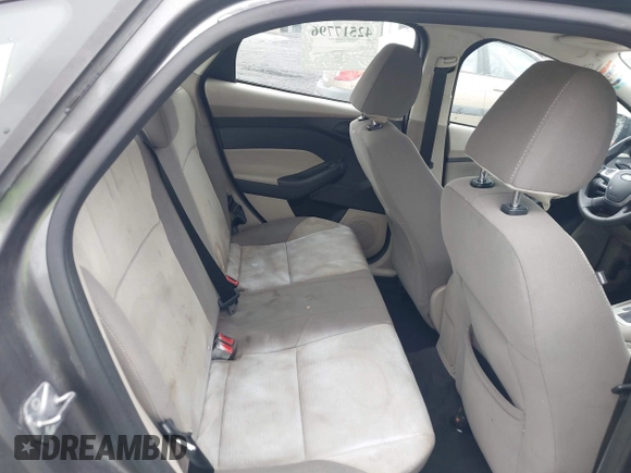 2012 Ford Focus SE z VIN 1FAHP3F29CL442731, wystawiony jako IAAI lot #42517796 z przebiegiem 148 728 mil mil oraz . Historia ofert i sprzedaży dostępna na DreamBid. Obrazek 8.