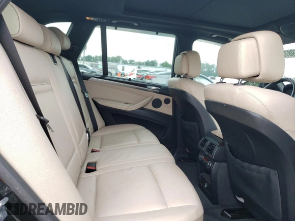 2011 BMW X5 50i with VIN 5UXZV8C52BL419028, listed as a Copart auction lot 59870505 with 126,666 mi miles and Salvage title. Bid and sale history available at DreamBid. Image 11.